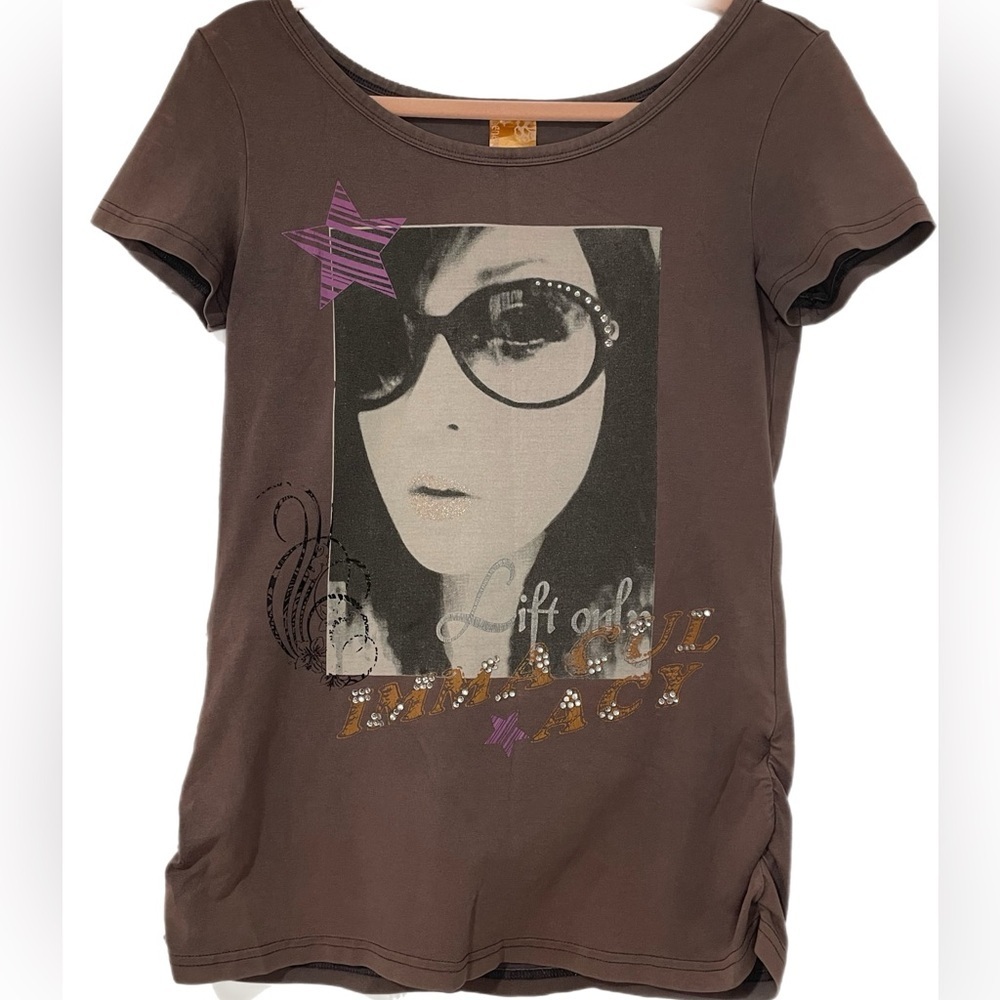 Generation Y graphic t side ruching features rhinestones and glitter as M OO